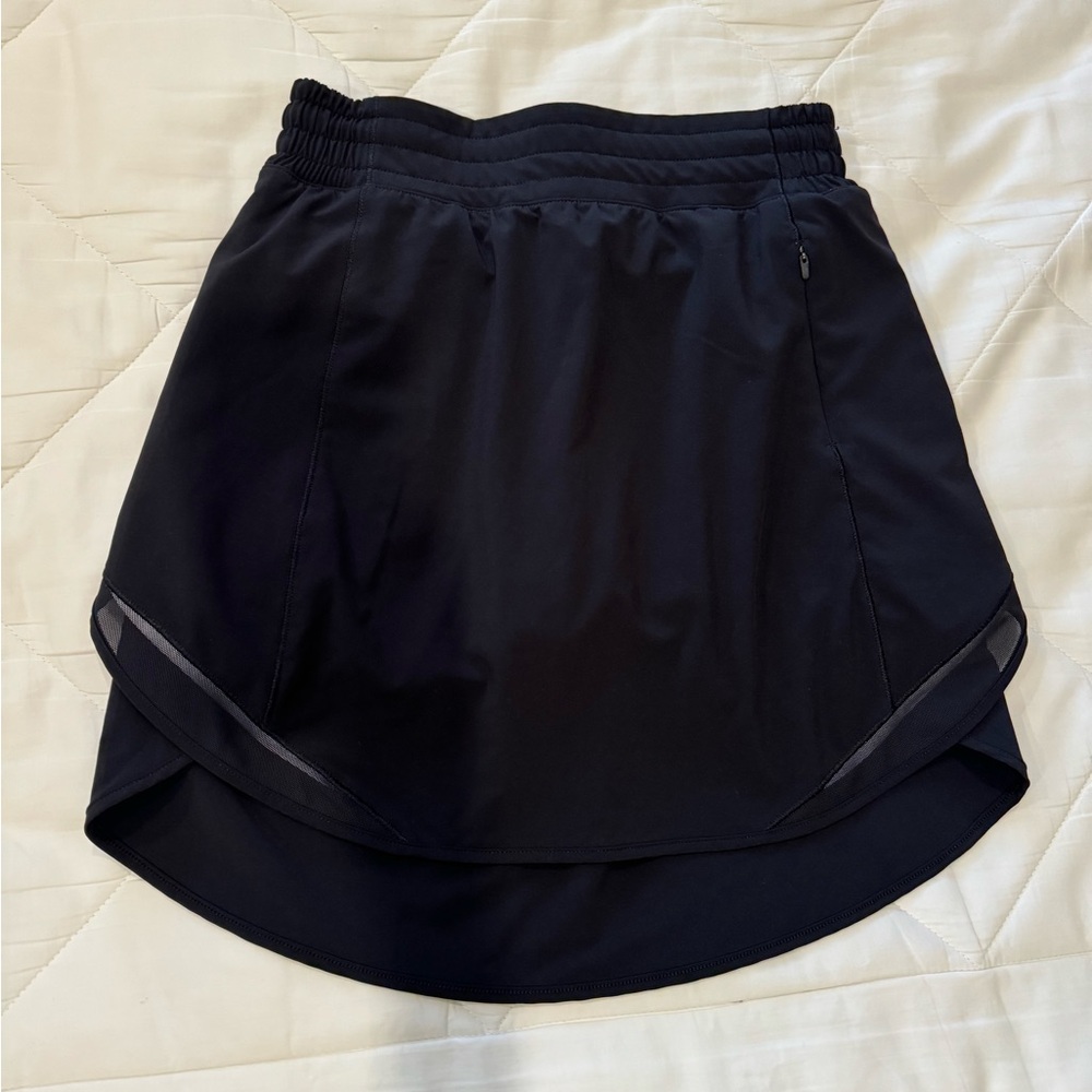Like new lululemon black skort. Worn once. Excellent condition!